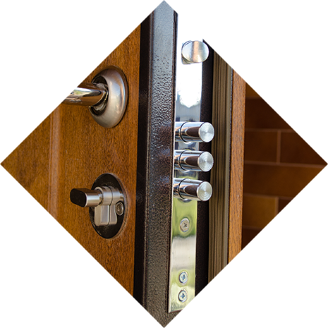A triangular image of a very secure door with multiple deadbolts.